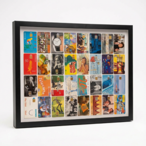 Tableau Télécartes — 32 souvenirs, 1 madeleine de Proust visuelle (50X40 cm)